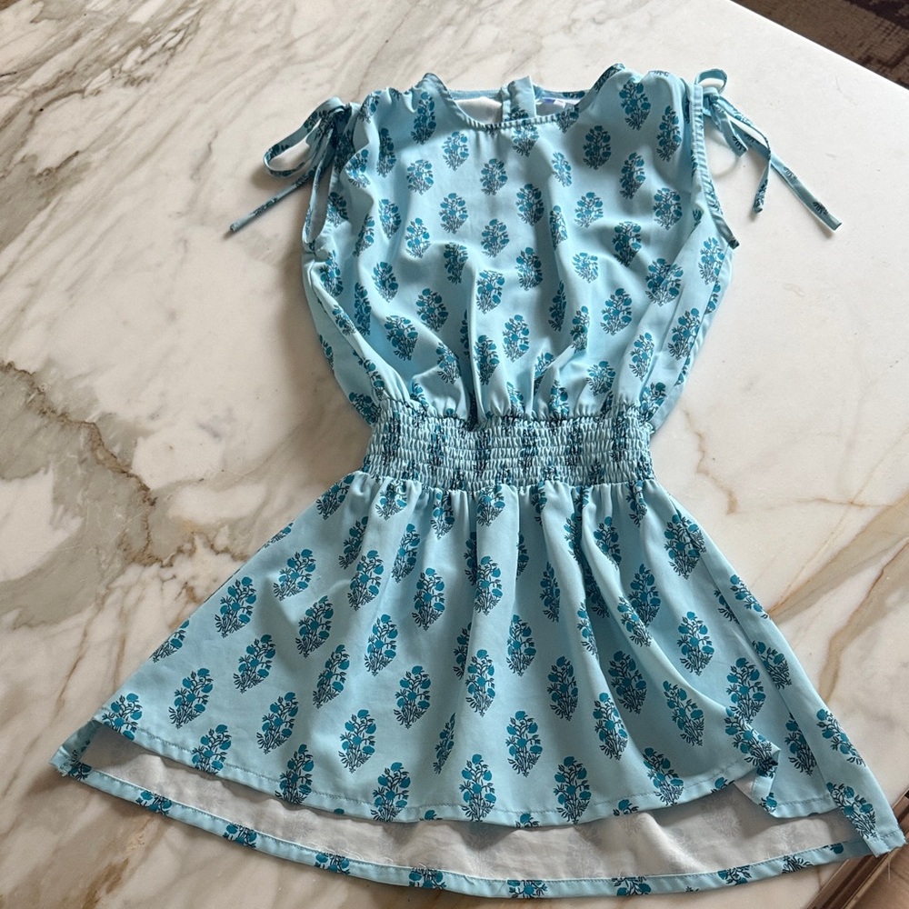Pleat Collection girl size 10Blue Floral Dress. No iron, zip back